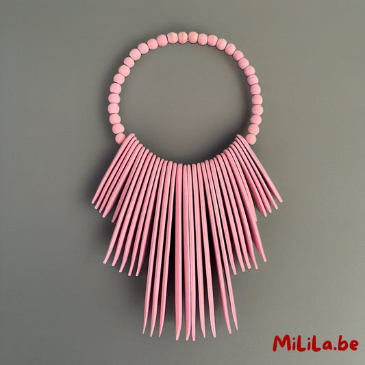 Handgemaakte roze houten wanddecoratie uit Bali