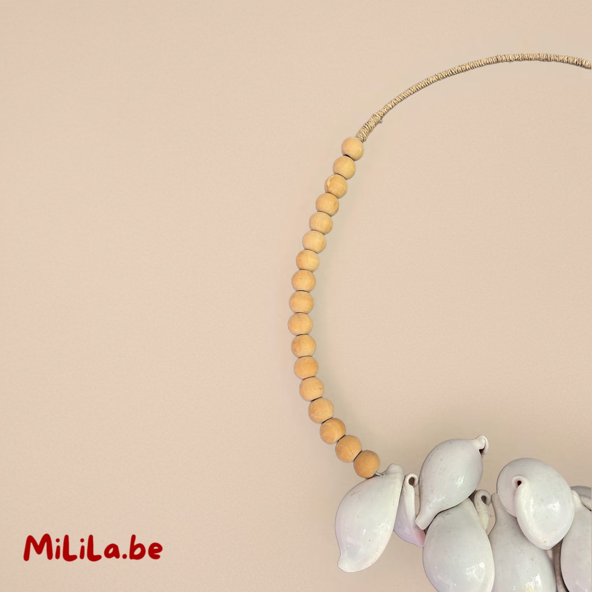 Bohemian wanddecoratie uit hout en schelpen