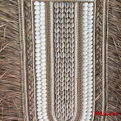 Natuurlijke wanddecoratie met raffia textuur